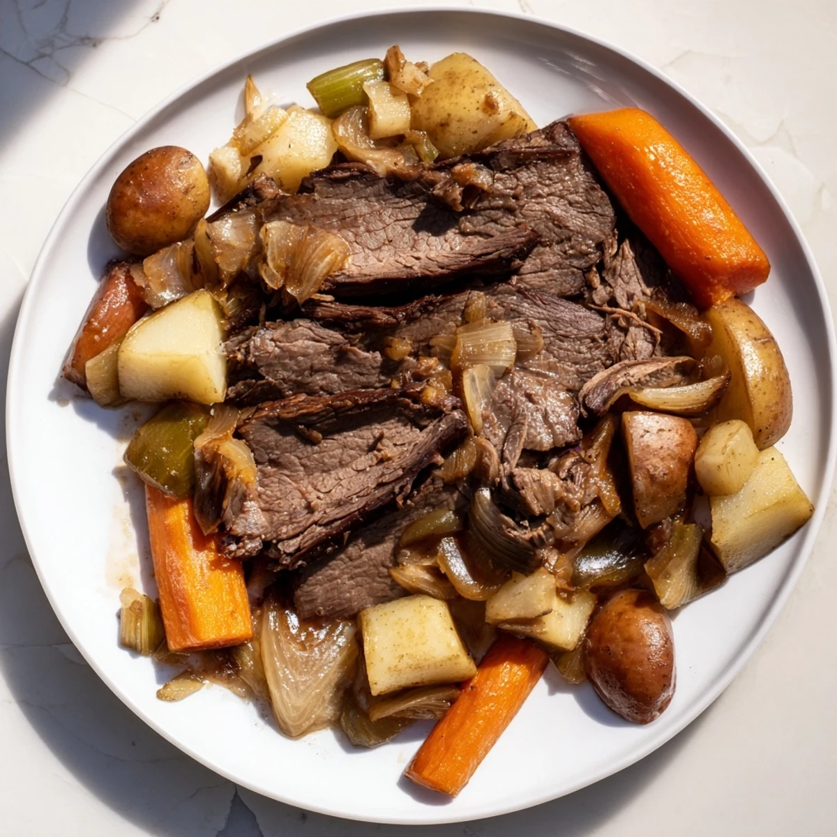 A tender, juicy Sunday Pot Roast with roasted vegetables, steaming, ready to serve with savory pan juices.