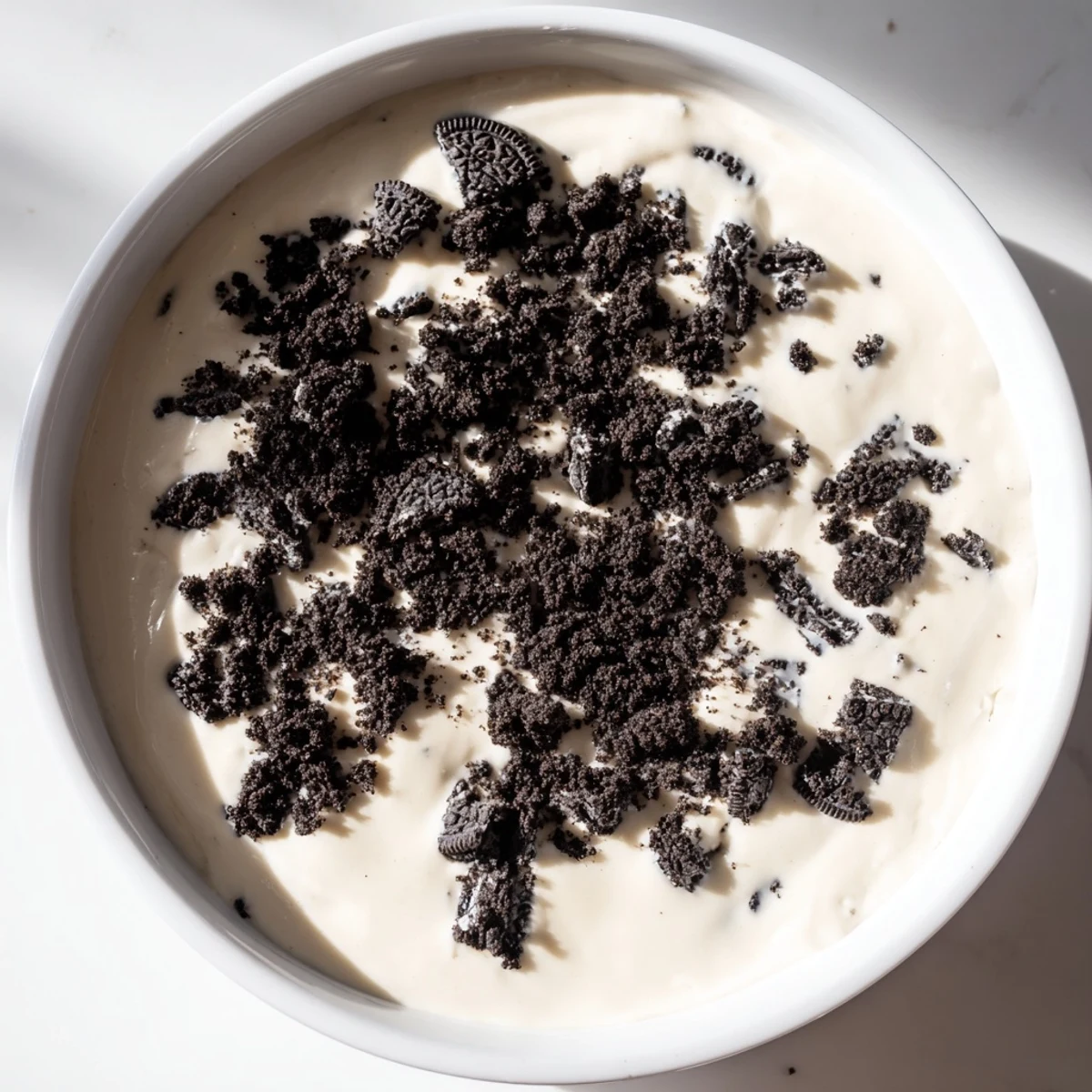 Imagine this: a beautiful vanilla pudding, generously strewn with Oreo cookie crumbs for crunch.
