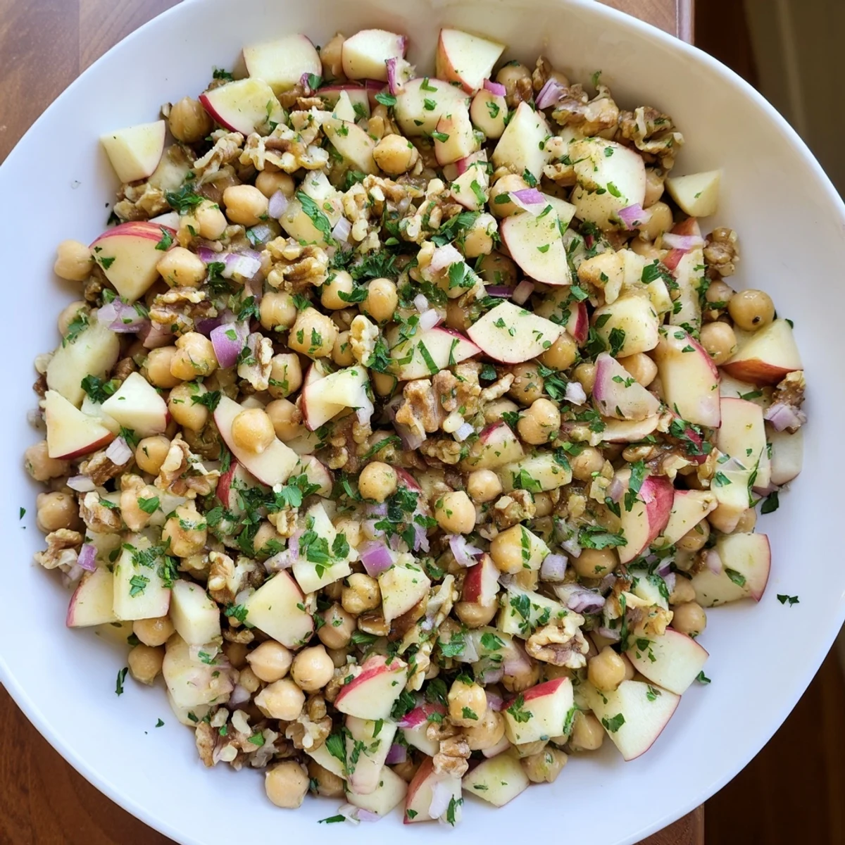 Vibrant Fall Harvest Apple and Chickpea Salad with crisp apples and a honey-mustard dressing is ready.