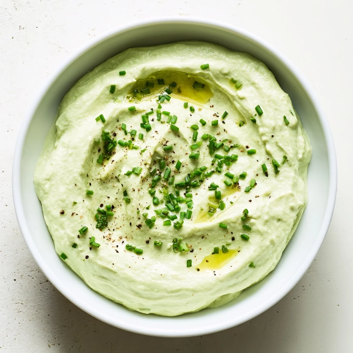 This homemade Avocado Cottage Cheese Dip features a smooth texture and the bright flavor of fresh lemon juice.