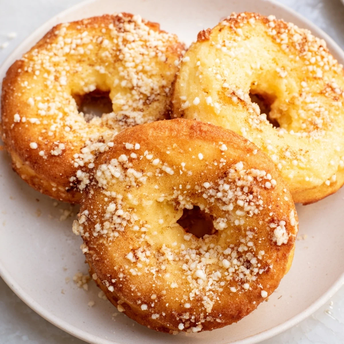 Sensational close-up of freshly made 1-Minute Air Fryer Donuts, ready to be enjoyed as a sweet treat.