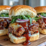 Juicy Peach Bourbon BBQ Meatloaf Sliders, a perfect bite with melted cheese.
