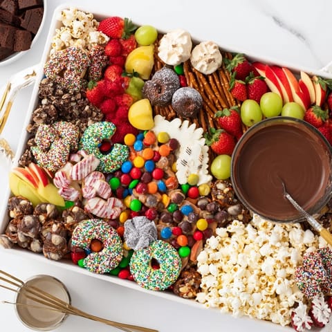 Delicious dessert boards featuring sweet treats and vibrant fruits for sharing joy.  