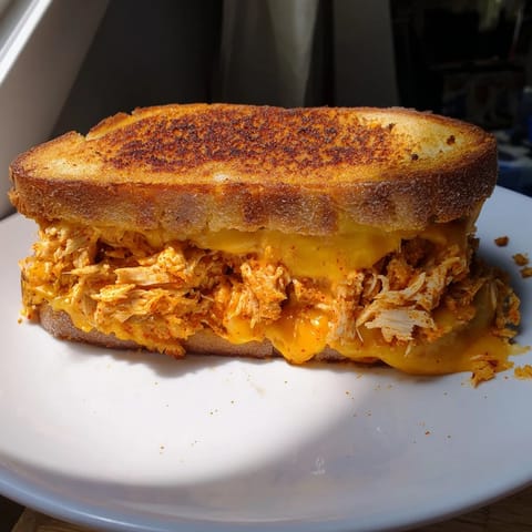 Imagine the amazing crunch of a Spicy Crispy Chicken Sandwich Grilled Cheese with a fiery kick.