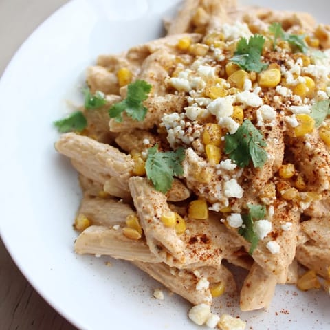This vibrant dish of Mexican Street Corn Pasta features perfectly cooked pasta with charred corn and spices.