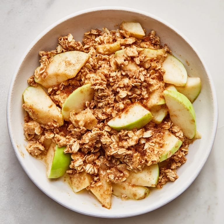 Warm and comforting Best Apple Crisp, a Thanksgiving dessert, perfect with ice cream or whipped cream.